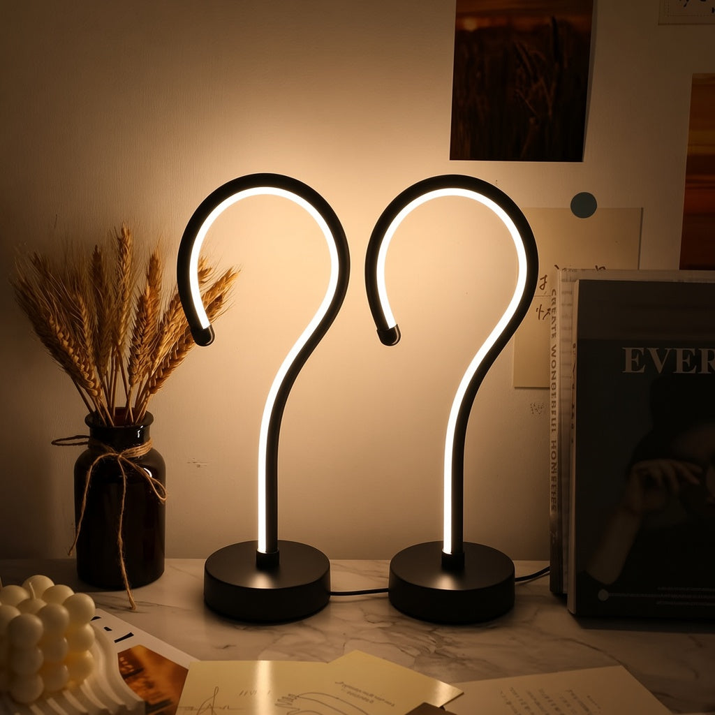 Question Mark Lamp set of two on a marble desk