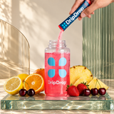 DripDrop Hydration Juicy Variety Pack Electrolyte Drink Mix Single-Serve Powder Packets- Grape Fruit Punch Strawberry Lemonade Cherry — how to mix on Zeniqas glass background
